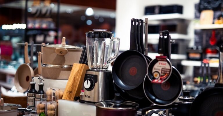 Top 5 Kitchen Appliances Every Modern Home Needs A vibrant selection of modern kitchen utensils including pans, blenders, and accessories.